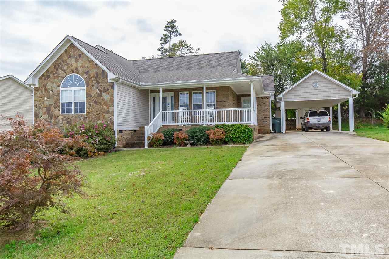 709 Ralph Graham Drive Graham, NC 27253 - Photo 2 of 30 Paved drive leads to detached carport