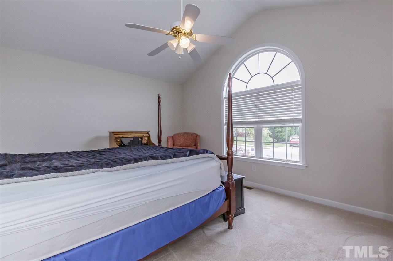 709 Ralph Graham Drive Graham, NC 27253 - Photo 15 of 30 CATHEDRAL ceiling and palladium window in this 15.3' x 12.3' space