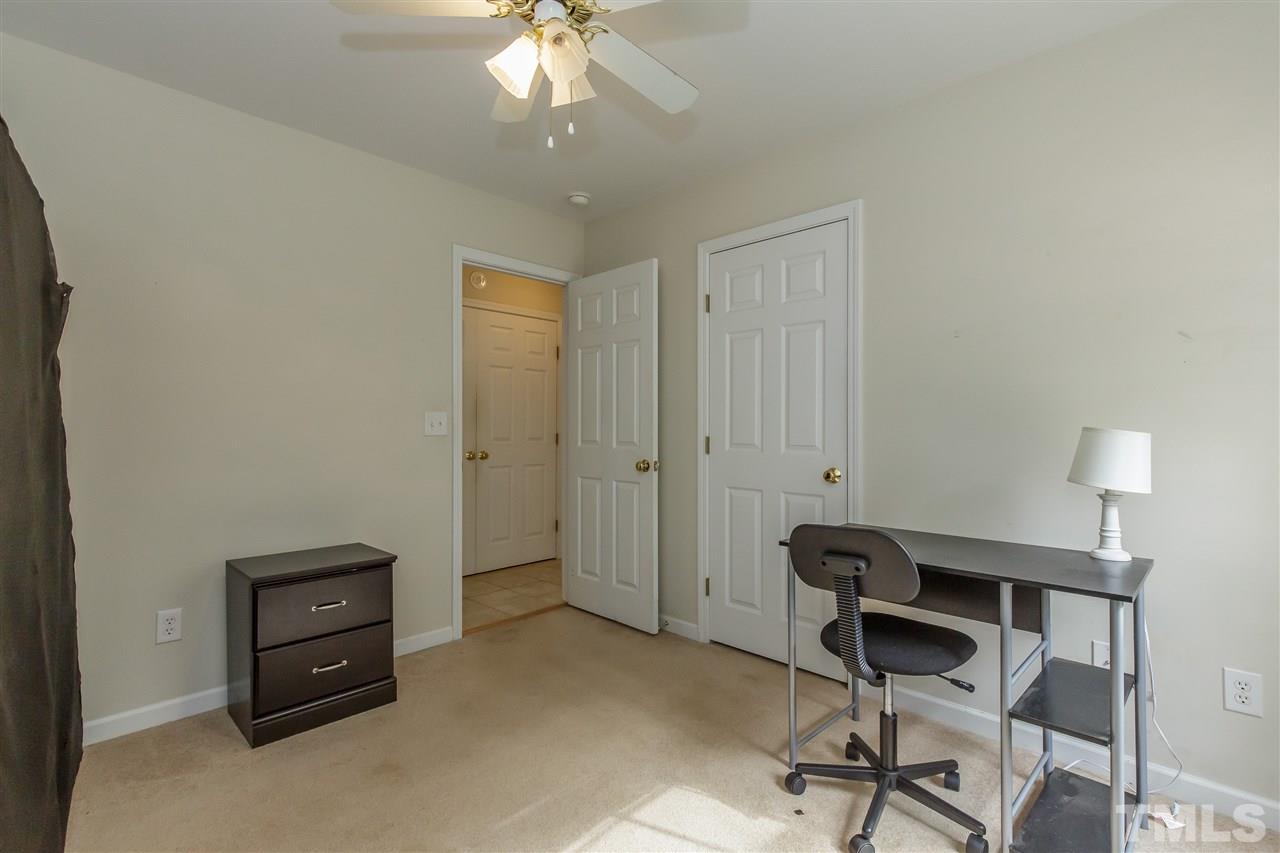 709 Ralph Graham Drive Graham, NC 27253 - Photo 21 of 30 Fan, carpet and closet, sitting on rear of home