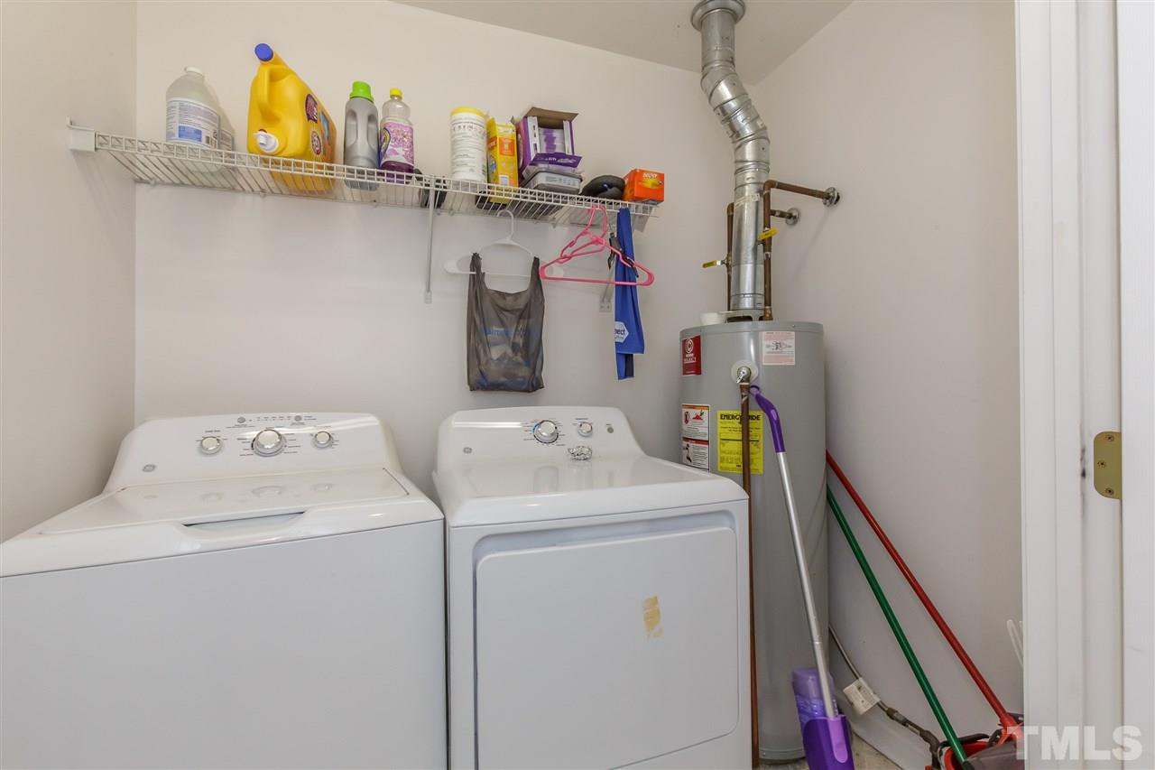 709 Ralph Graham Drive Graham, NC 27253 - Photo 22 of 30 Laundry measures 7.1' x 4.3' with upper shelf