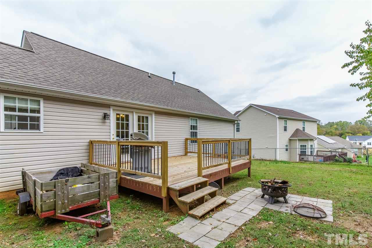709 Ralph Graham Drive Graham, NC 27253 - Photo 26 of 30 Ready for your table and chairs, grill, hammock and more