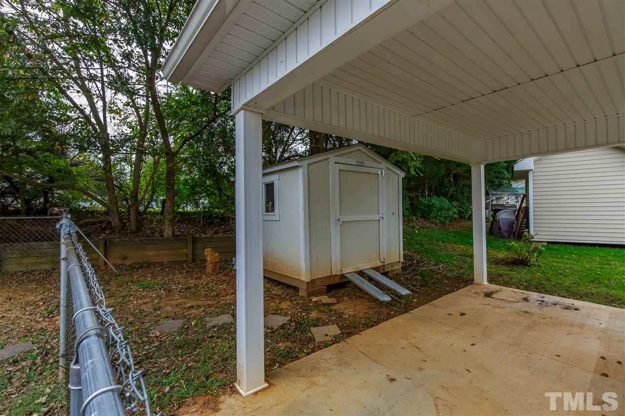 709 Ralph Graham Drive Graham, NC 27253 - Photo 29 of 30 Storage building and carport which measures 24' x 14'