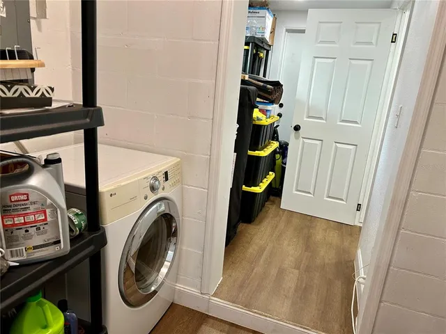 a view of a storage & utility room with washer and dryer