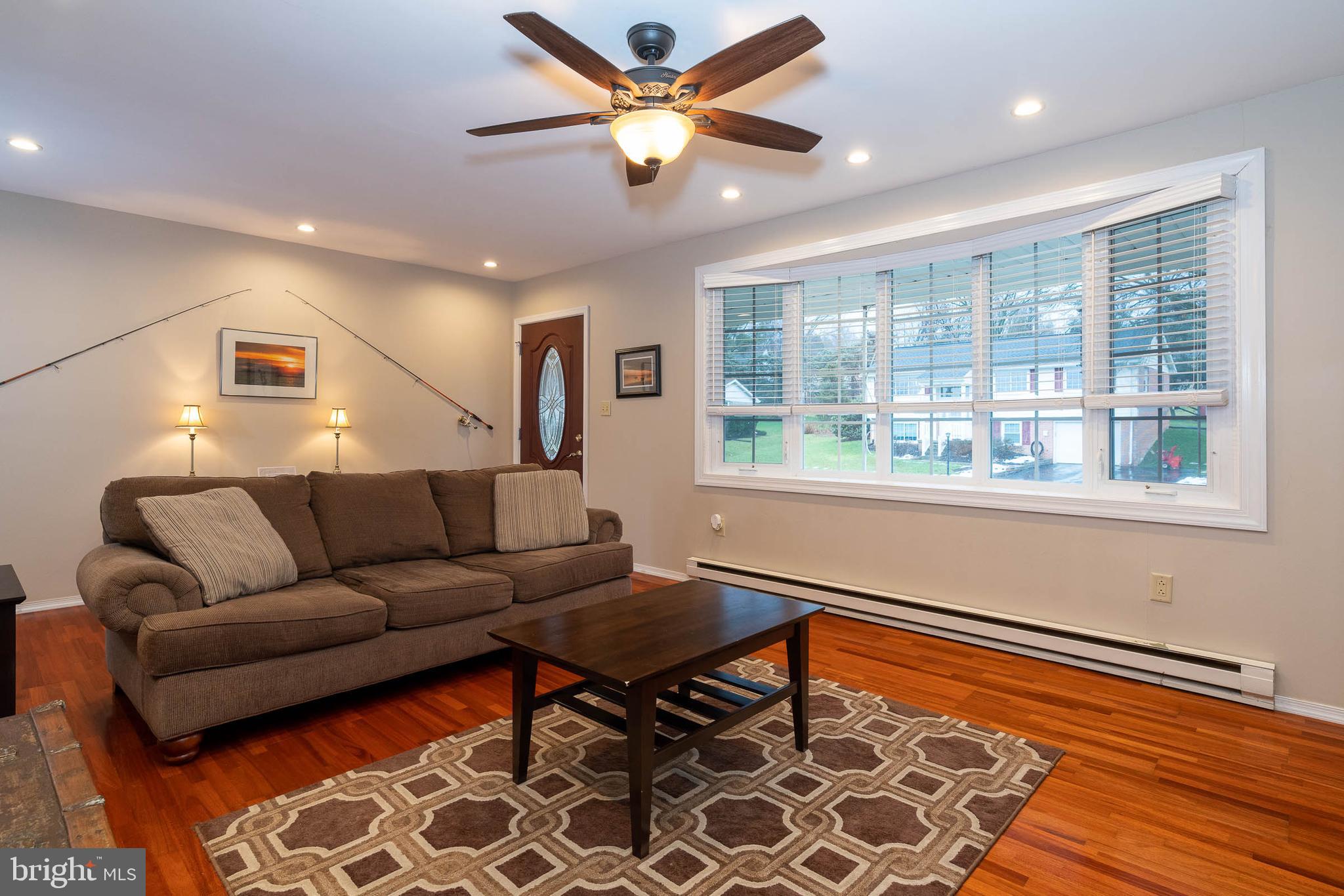 115 Swarthmore Drive Lititz, PA 17543 - Photo 3 of 21 Living room has picture window and hardwood floors