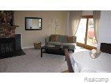 42335 Park Ridge Road Novi, MI 48375 - Photo 5 of 17 Family room with fireplace!!