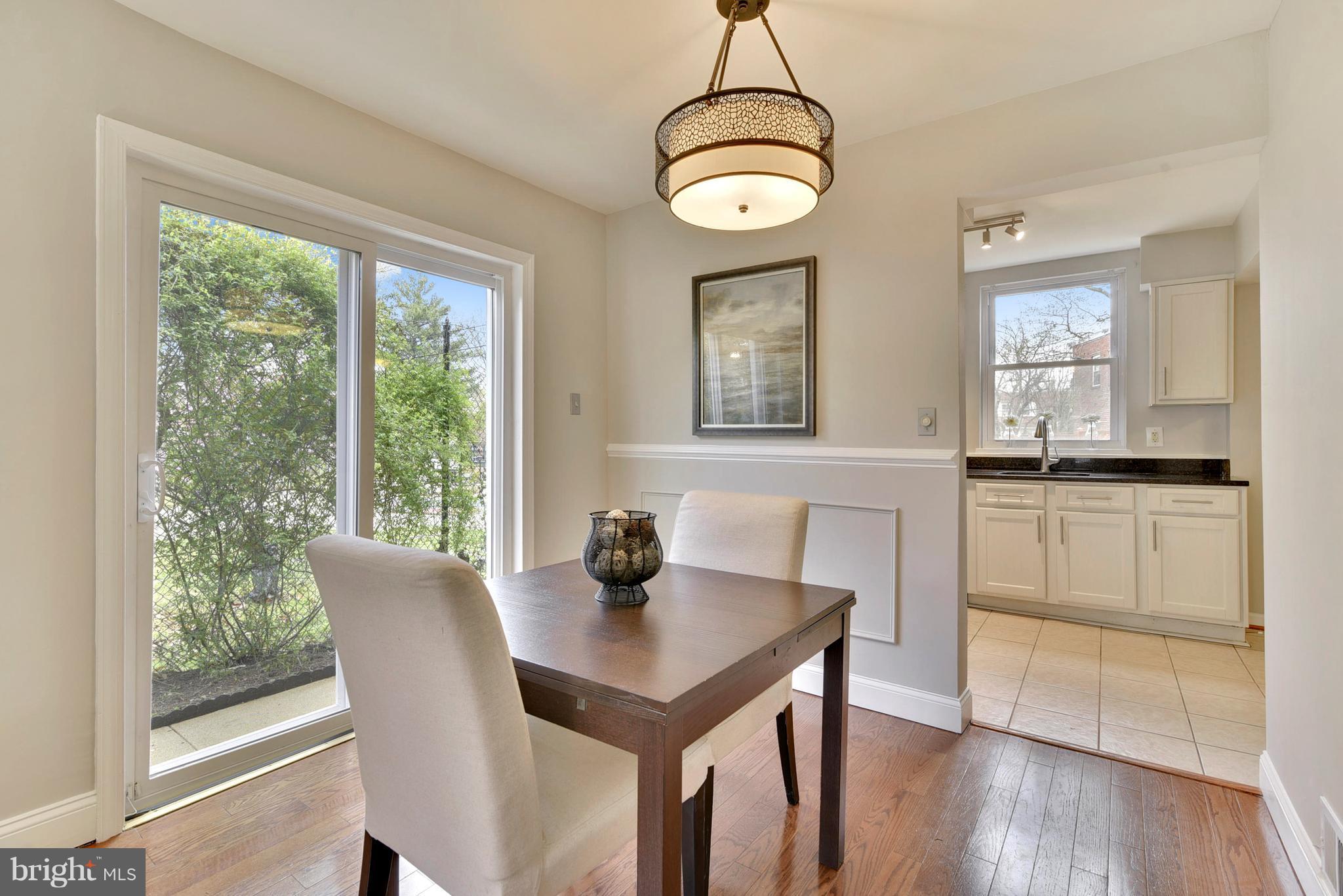 51 West Reed Avenue Alexandria, VA 22305 - Photo 7 of 30 Dining room with access to patio