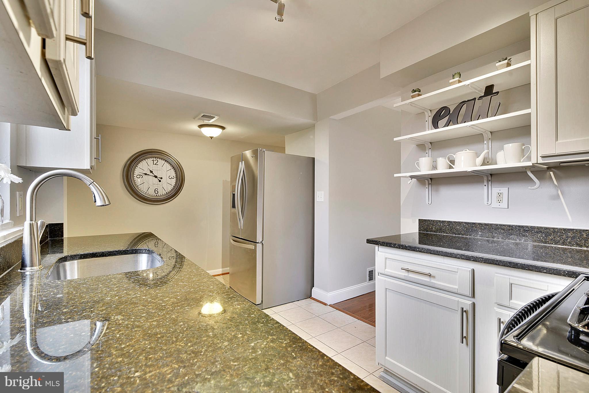 51 West Reed Avenue Alexandria, VA 22305 - Photo 9 of 30 Stainless dishwasher and refrigerator