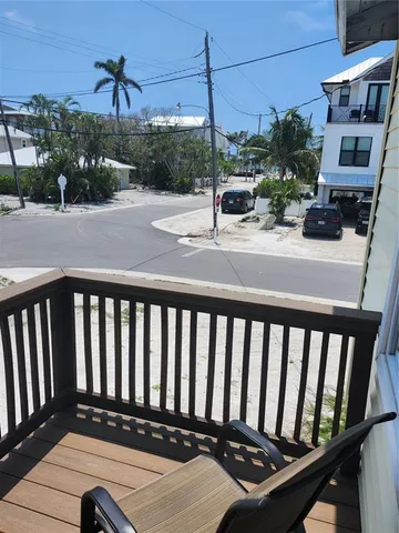 a view of balcony with furniture