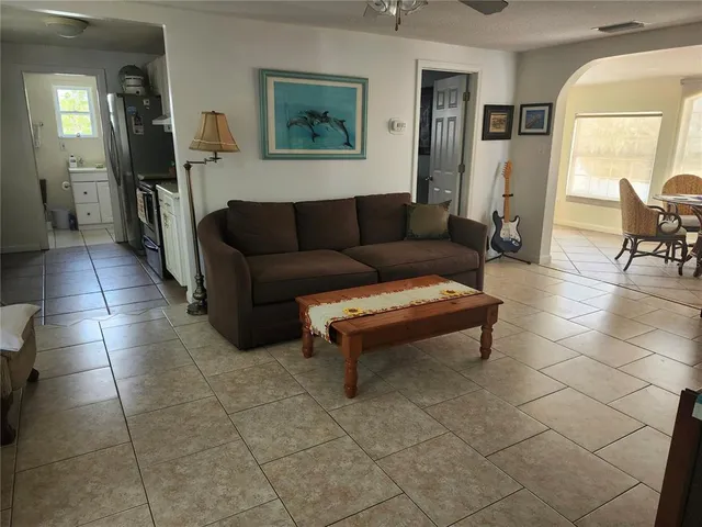 a living room with a couch and a coffee table