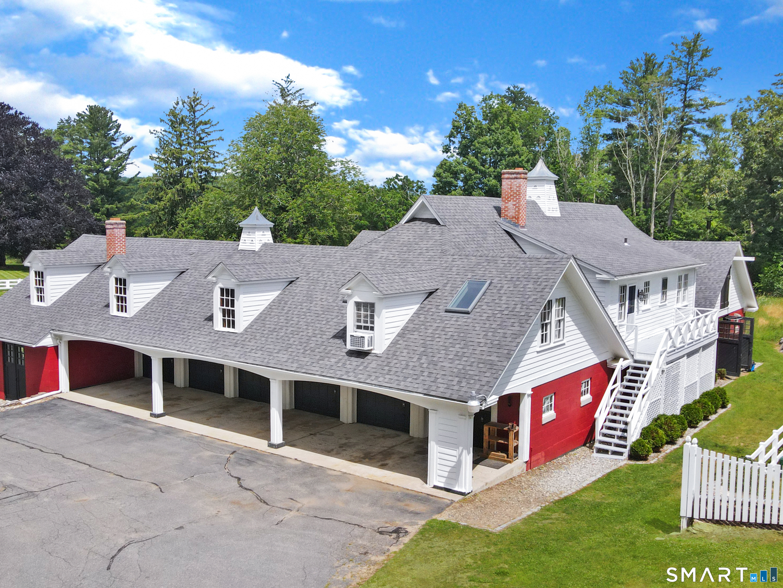 433 Wrights Crossing Road Pomfret Center, CT 06259 - Photo 31 of 40 A Car enthusiast's dream with 6 stalls to keep your classic cars. Also, a 3 bedroom apartment above the back end of the stable.