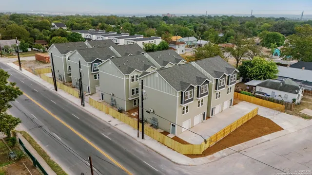 an aerial view of a house with a garden