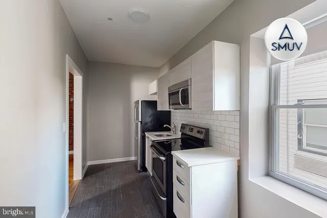a view of kitchen and washer and dryer