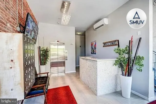 a view of living room and kitchen