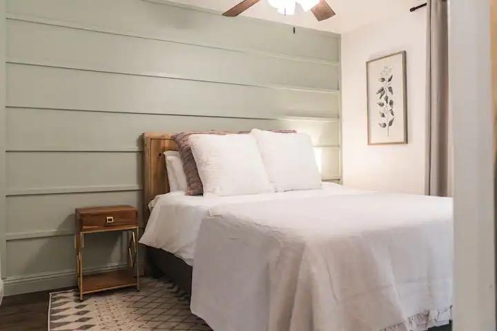 33209 Road 222 North Fork, CA 93643 - Photo 8 of 23 a bedroom with a bed and a night stand