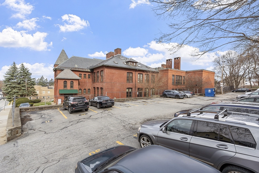 31 Elizabeth Street, Unit G3 Worcester, MA 01605 - Photo 28 of 28 a view of a cars park in front of house
