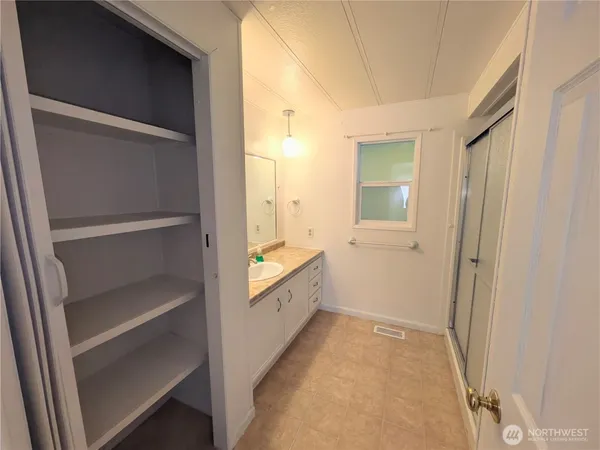 an empty room with windows