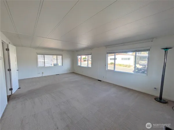 an empty room with windows