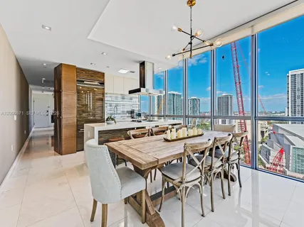 a view of a dining room with furniture