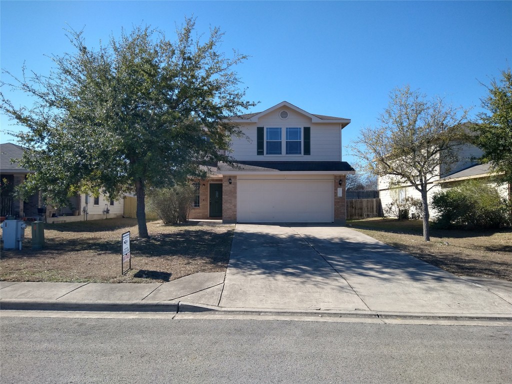 173 Ruby Lake Drive Kyle, TX 78640 - Photo 1 of 9 a front view of house with yard