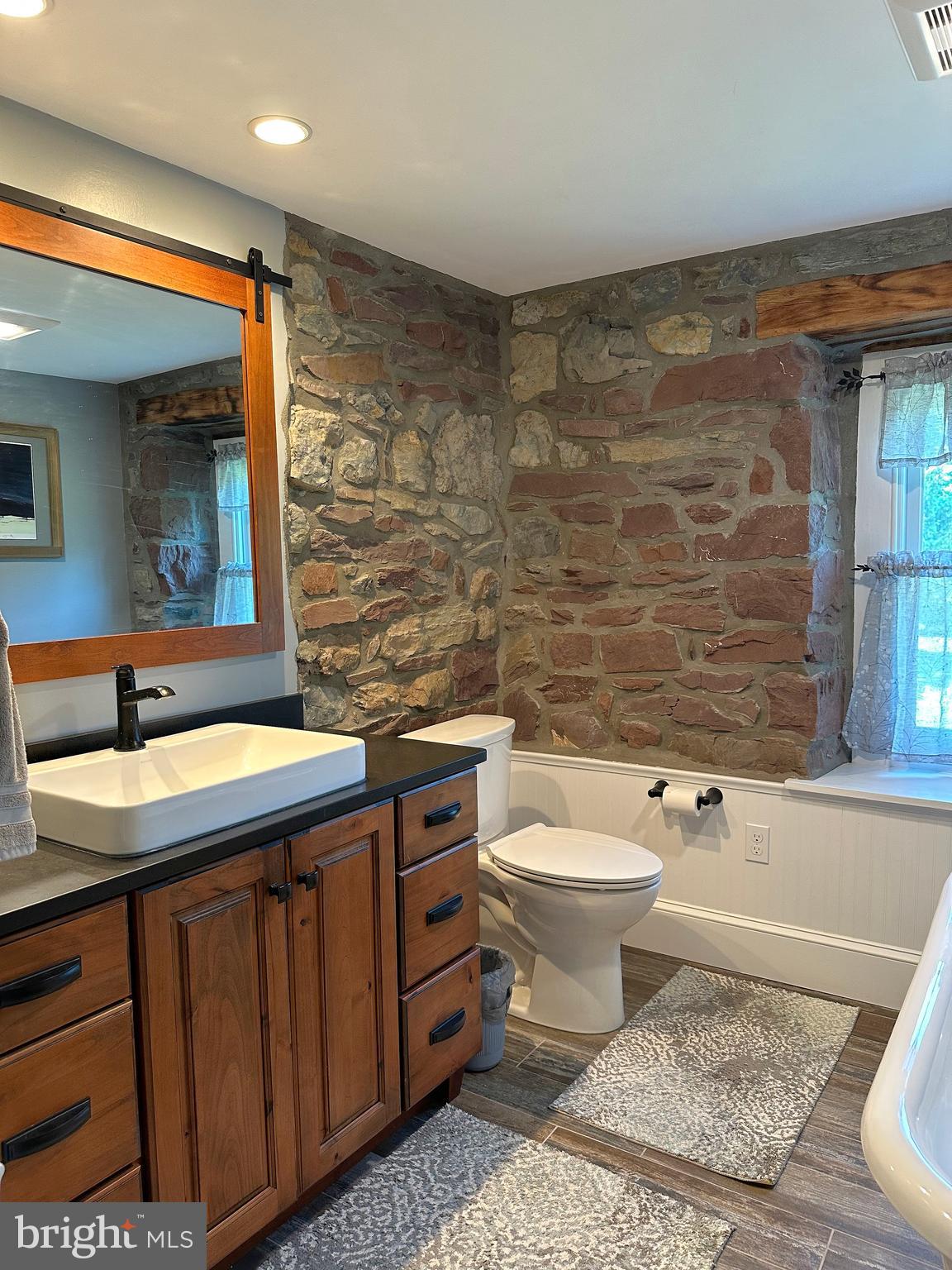 2382 Bergey Road Harleysville, PA 19438 - Photo 41 of 52 a bathroom with a granite countertop sink toilet and shower
