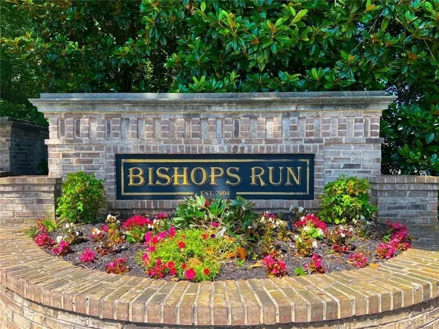 a view of sign board with flower