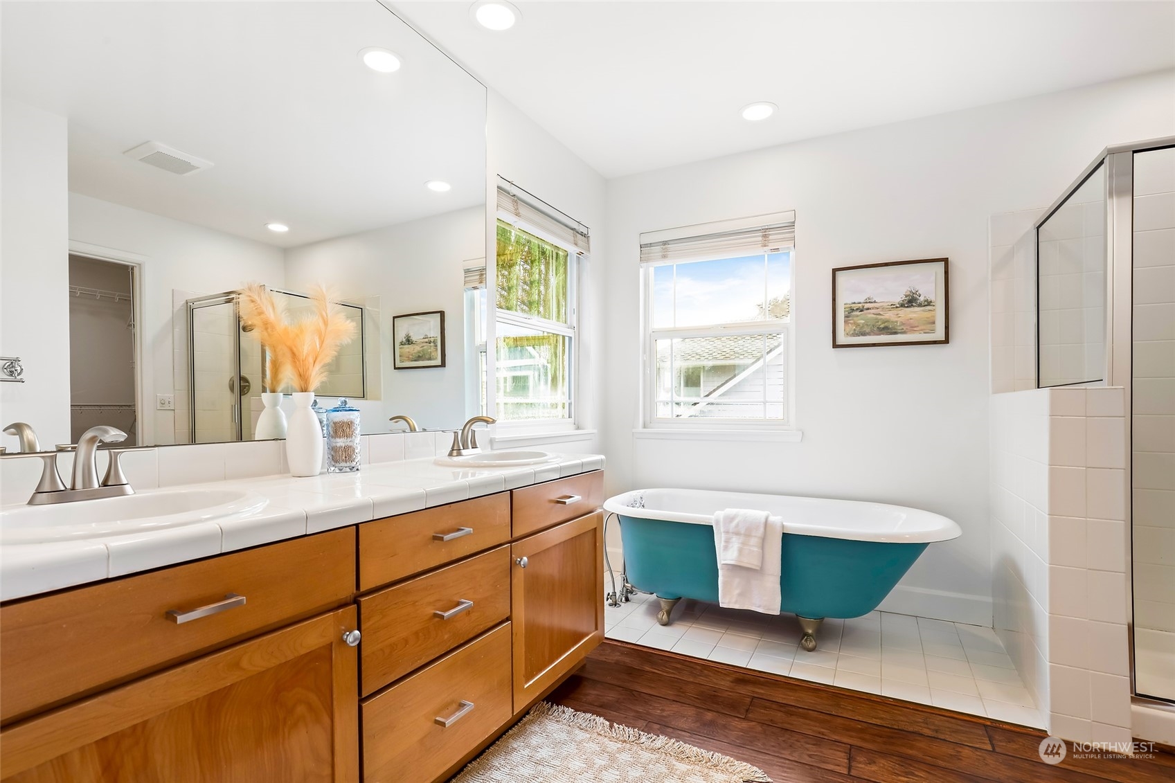 23303 8th Place West Bothell, WA 98021 - Photo 12 of 33 a spacious bathroom with a granite countertop sink mirror and bathtub