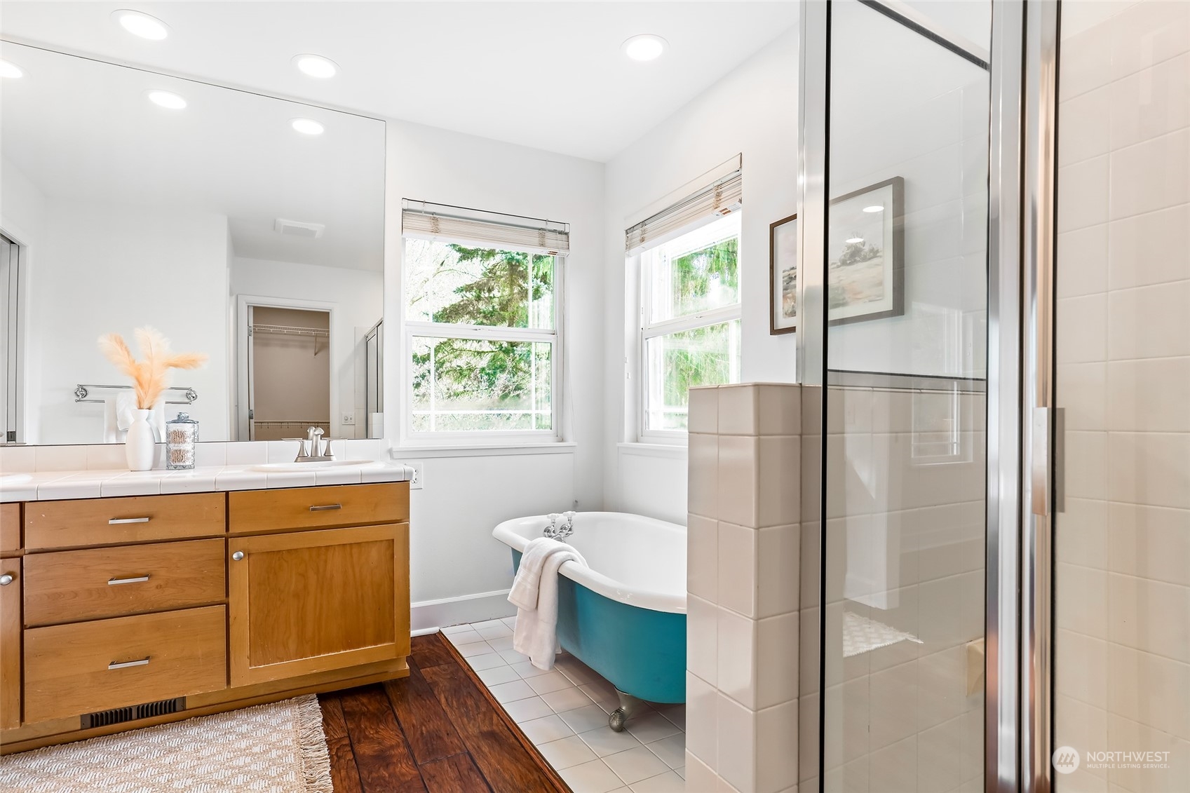 23303 8th Place West Bothell, WA 98021 - Photo 13 of 33 a bathroom with a double vanity sink toilet and shower