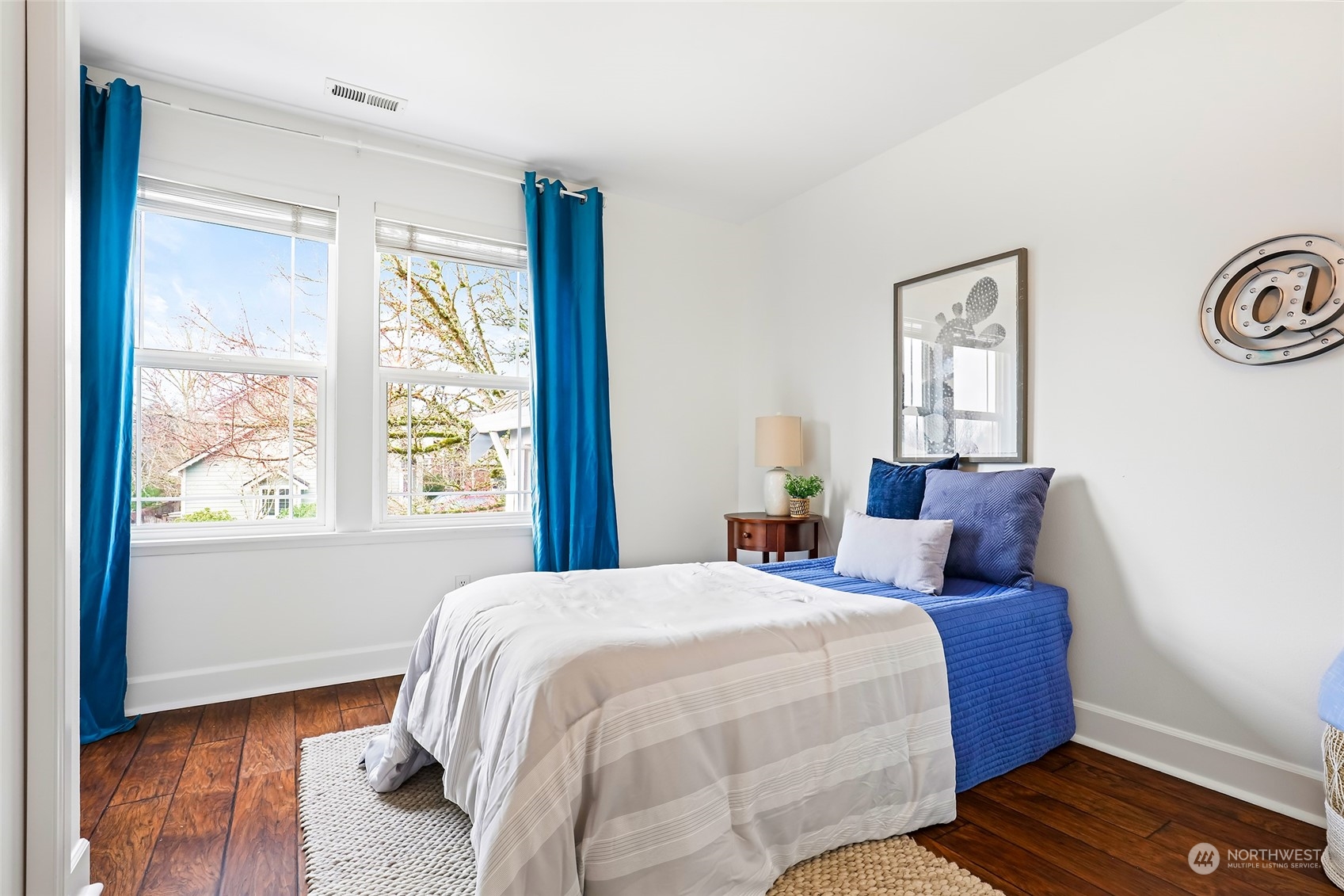 23303 8th Place West Bothell, WA 98021 - Photo 16 of 33 a bedroom with a bed and a window