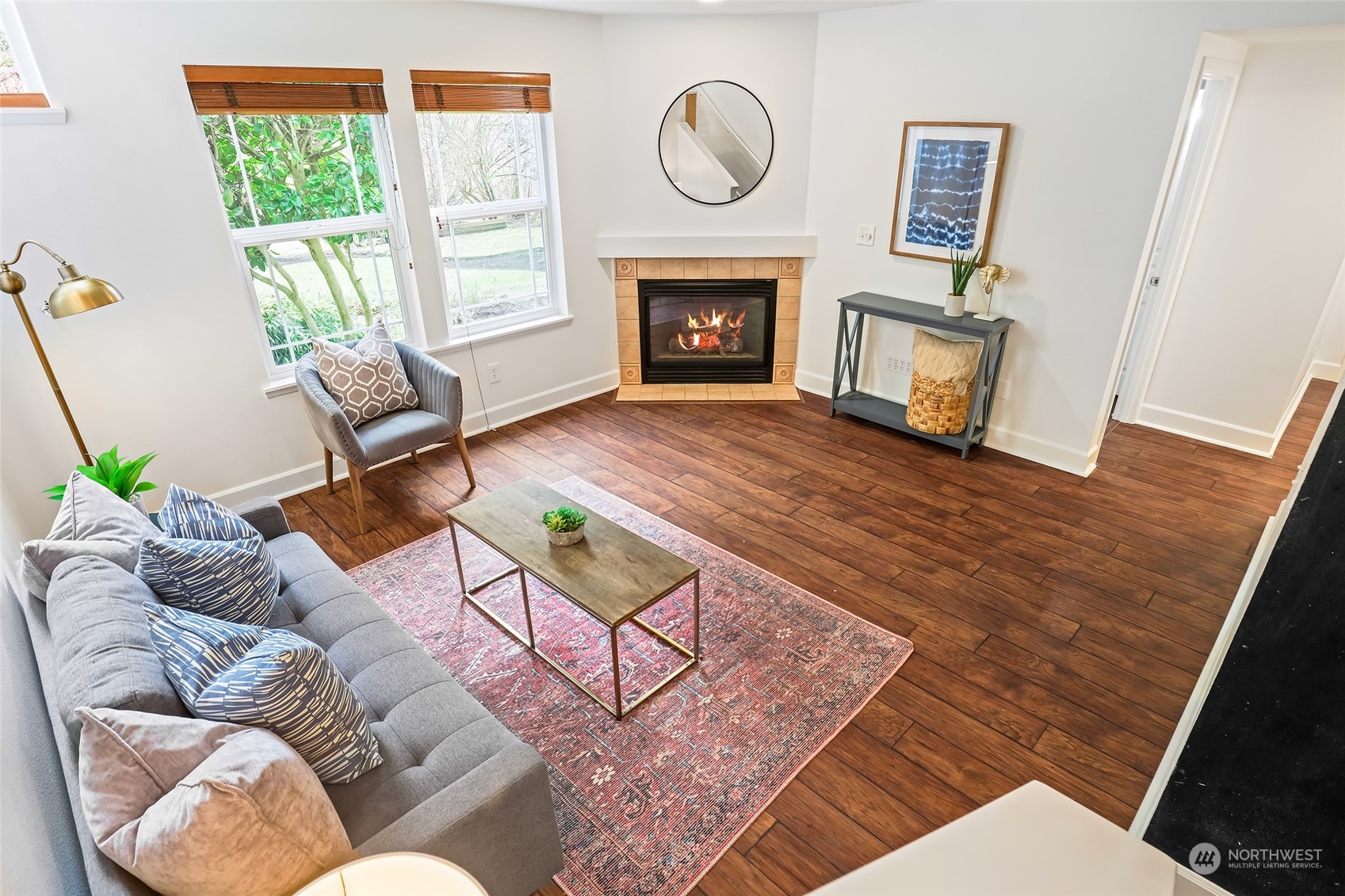 23303 8th Place West Bothell, WA 98021 - Photo 18 of 33 a living room with furniture a window and a fireplace