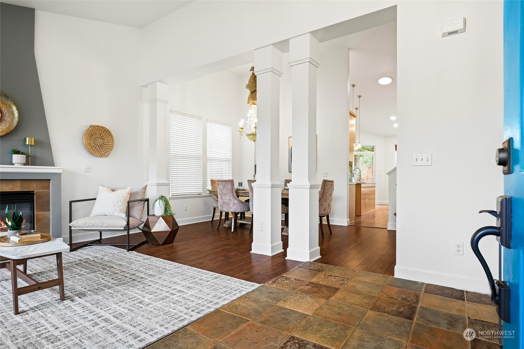 23303 8th Place West Bothell, WA 98021 - Photo 2 of 33 a living room with furniture a rug and a fireplace