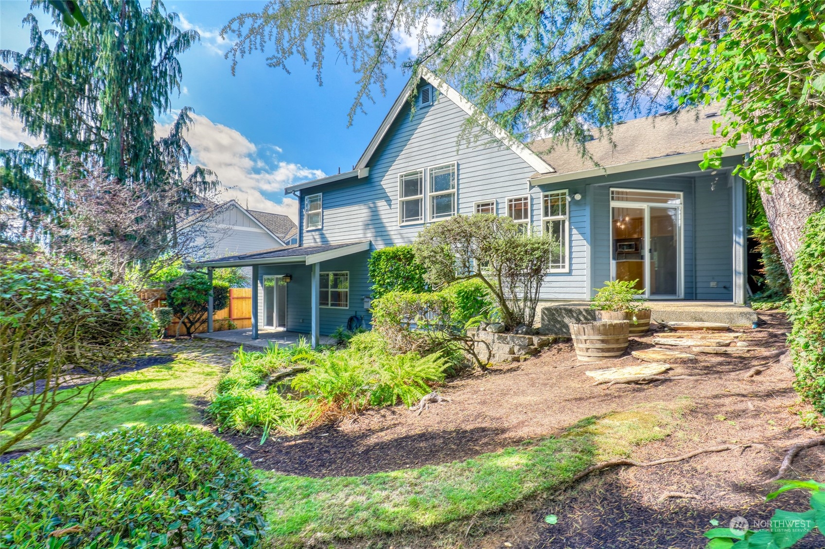 23303 8th Place West Bothell, WA 98021 - Photo 23 of 33 a view of a house with backyard and garden