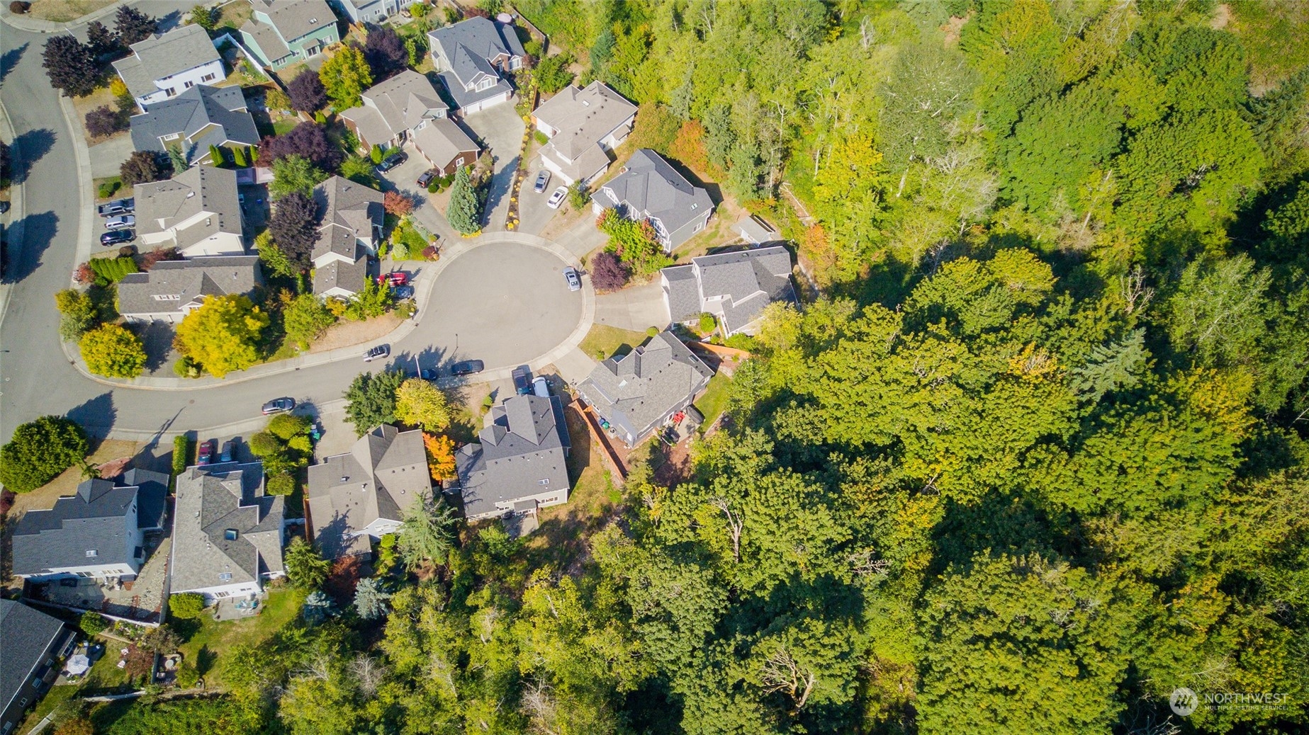 23303 8th Place West Bothell, WA 98021 - Photo 32 of 33 an aerial view of residential house with swimming pool and lawn chairs