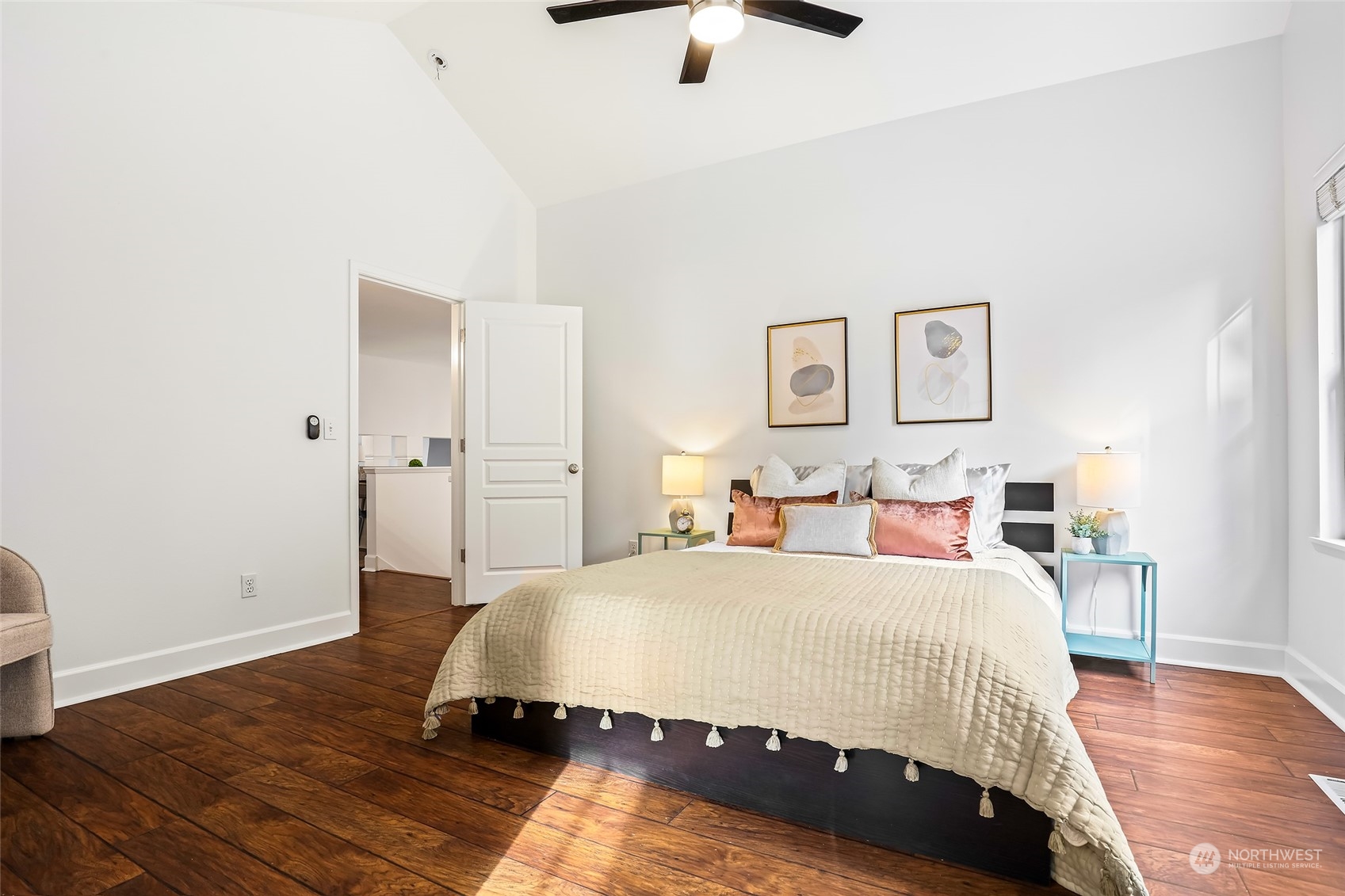 23303 8th Place West Bothell, WA 98021 - Photo 10 of 33 a bedroom with a bed and wooden floor
