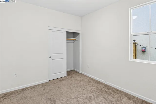 an empty room with shelves