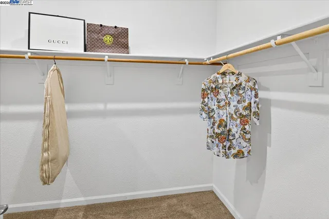 a bathroom with sinks a mirror and a shower