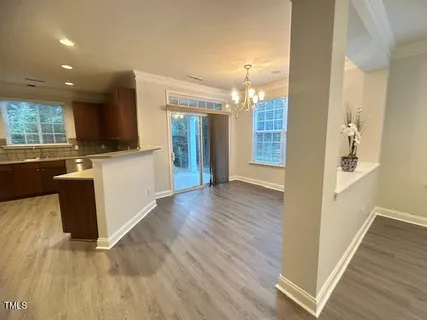 a view of a kitchen from the hallway