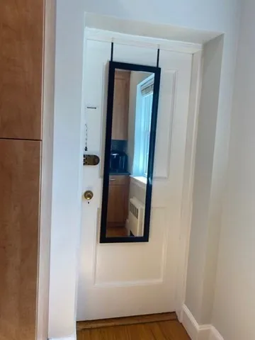 a bathroom with a sink and mirror