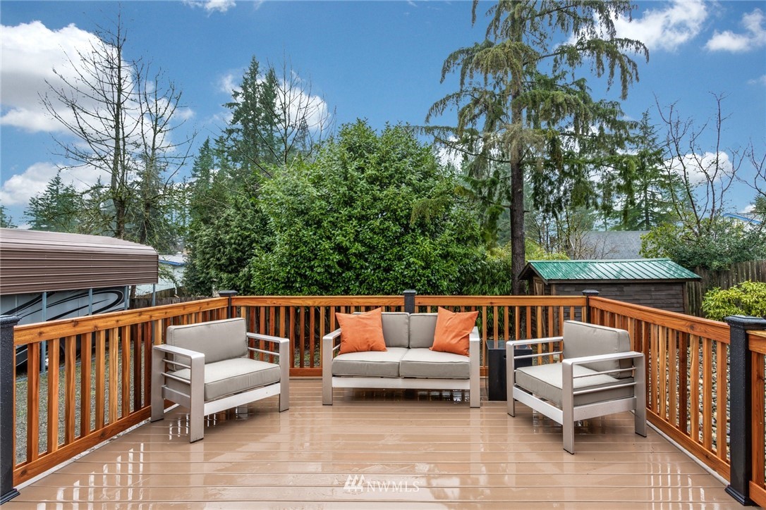 22936 Southeast 288th Street Maple Valley, WA 98038 - Photo 15 of 26 a view of sitting area with furniture and outdoor seating