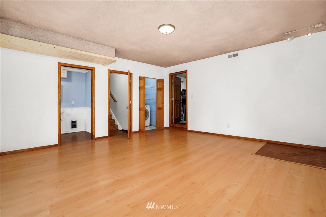 22936 Southeast 288th Street Maple Valley, WA 98038 - Photo 20 of 26 a view of an empty room with a window