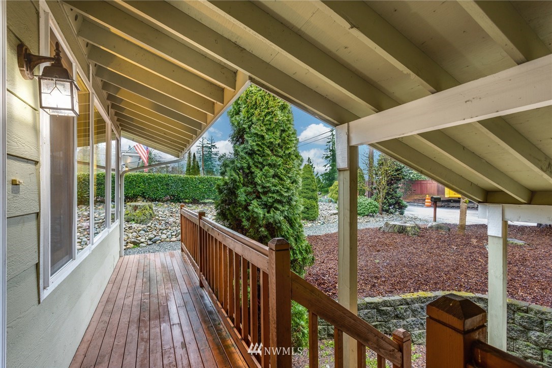 22936 Southeast 288th Street Maple Valley, WA 98038 - Photo 21 of 26 a view of balcony with wooden floor and fence