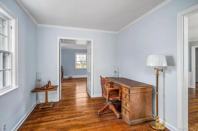 a view of living room with a large window