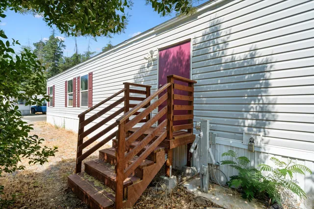 a view of a house with a street