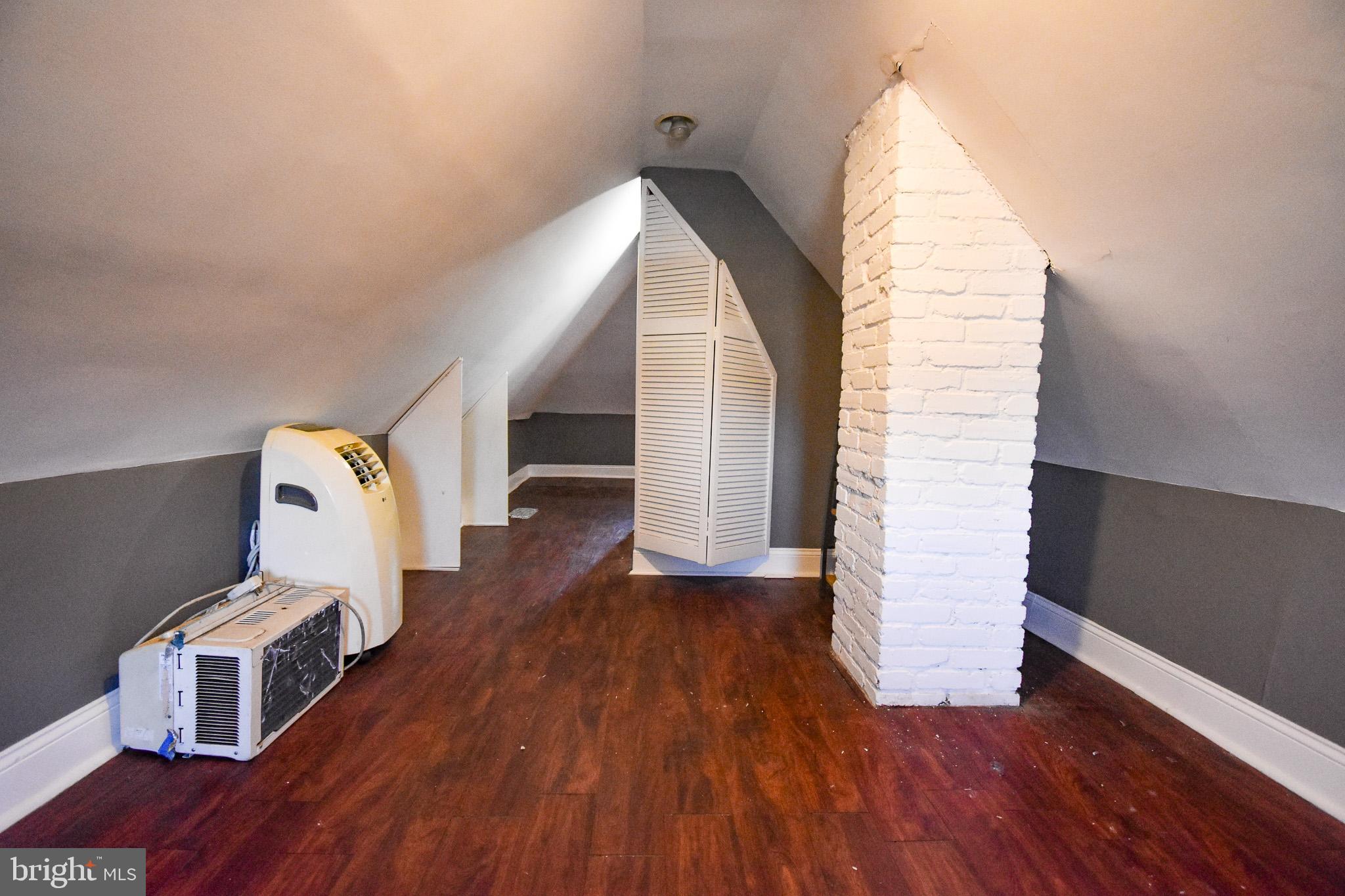 1921 Rhode Island Avenue Northeast Washington, DC 20018 - Photo 18 of 23 a view of an entryway with wooden floor