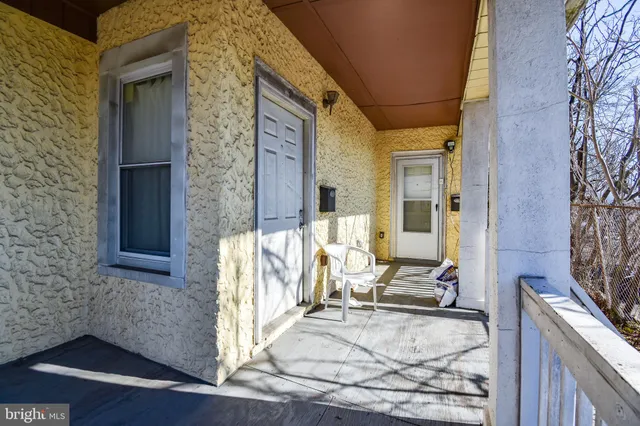 a balcony with wooden floor