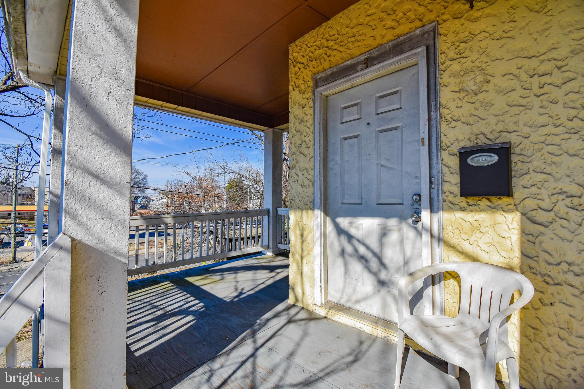 1921 Rhode Island Avenue Northeast Washington, DC 20018 - Photo 23 of 23 a balcony with wooden floor