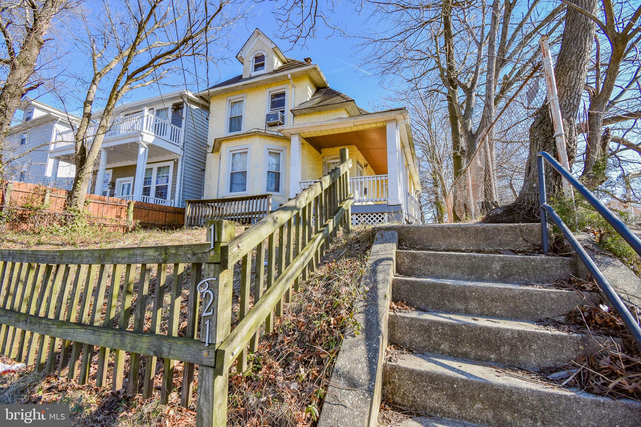 1921 Rhode Island Avenue Northeast Washington, DC 20018 - Photo 3 of 23 a view of a house with wooden stairs