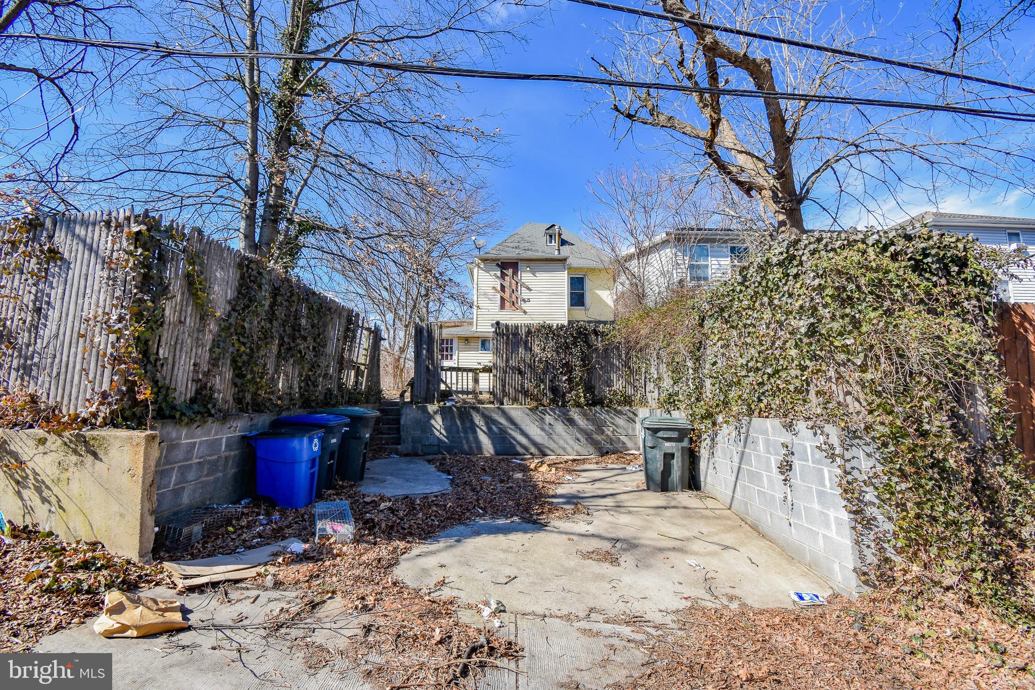 1921 Rhode Island Avenue Northeast Washington, DC 20018 - Photo 7 of 23 a view of a house with snow on the road
