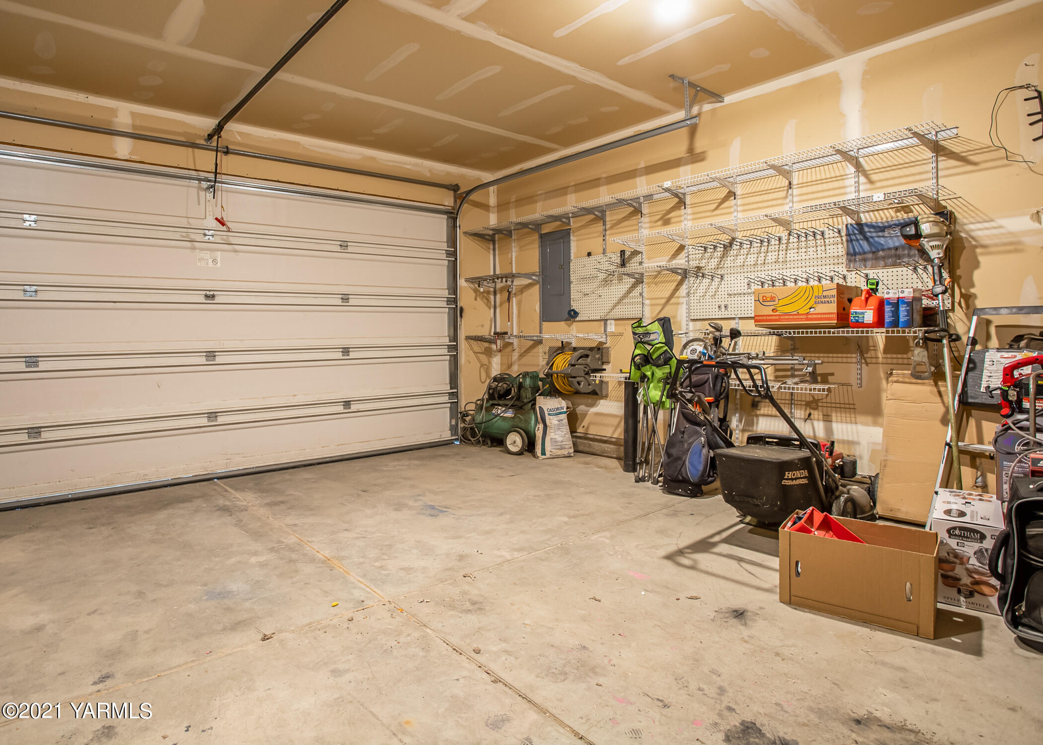 391 Sheep Company Road Selah, WA 98942 - Photo 20 of 26 a view of a storage room with a lot of stuff