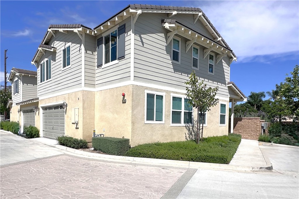 9318 Hellman Avenue, Unit 4 Rancho Cucamonga, CA 91730 - Photo 1 of 28 front view of a house