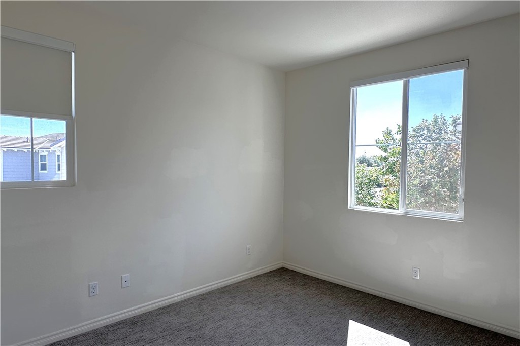 9318 Hellman Avenue, Unit 4 Rancho Cucamonga, CA 91730 - Photo 18 of 28 an empty room with a window
